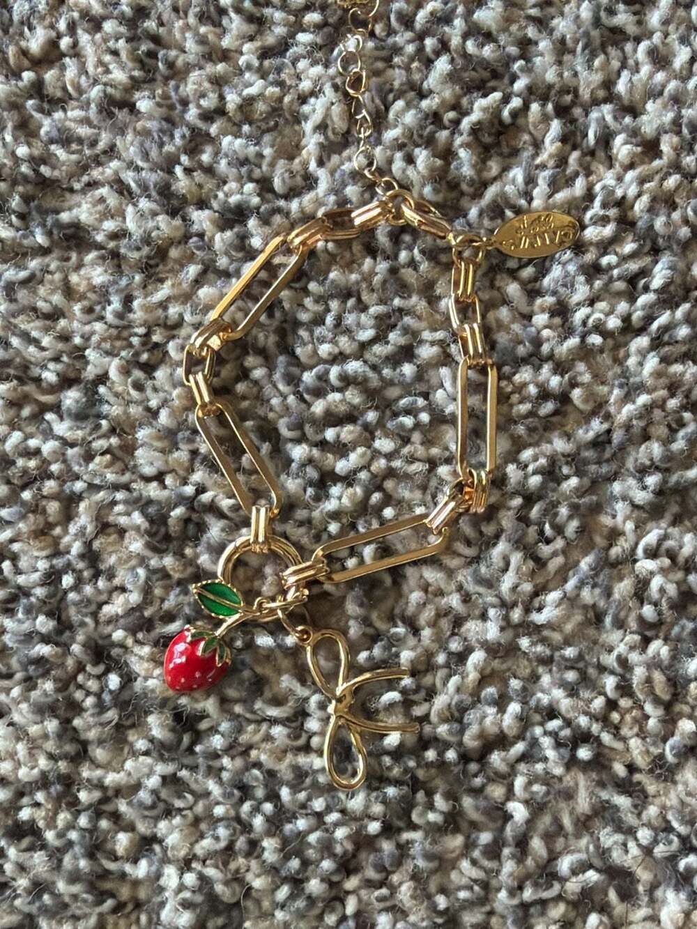 Canvas Jewelry Gold Tone Strawberry and Bow Charm Bracelet